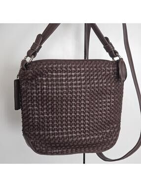 The Sak brown leather weaved crossbody bag.